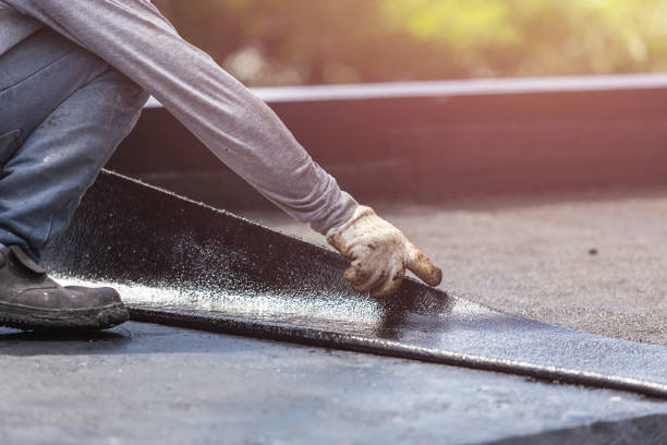 Professional Basement Waterproofing technician working in Waldorf, MD